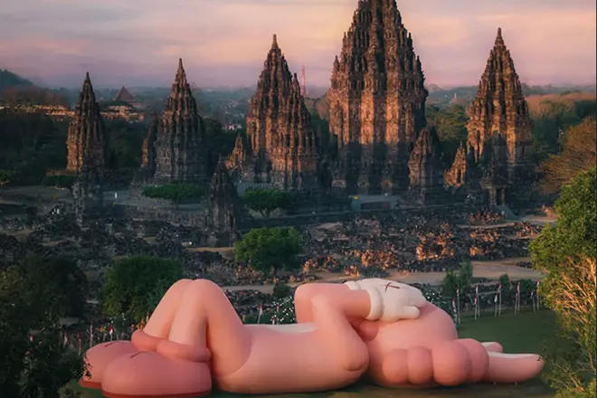 KAWS:HOLIDAY LANDS AT INDONESIAN TEMPLE COMPOUND